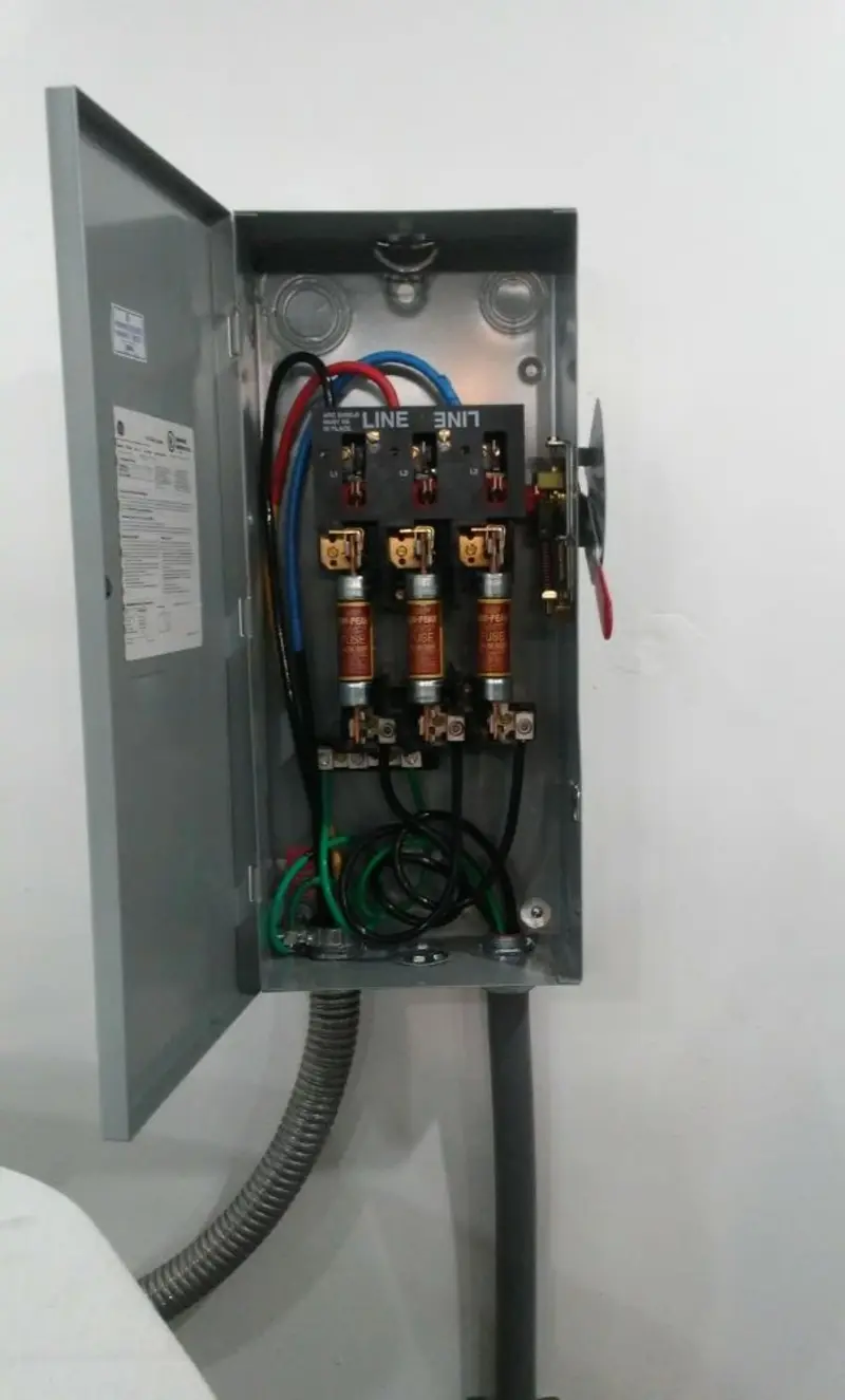 Three-phase disconnect switch installed for Smoke Detector Installation in Lindsborg