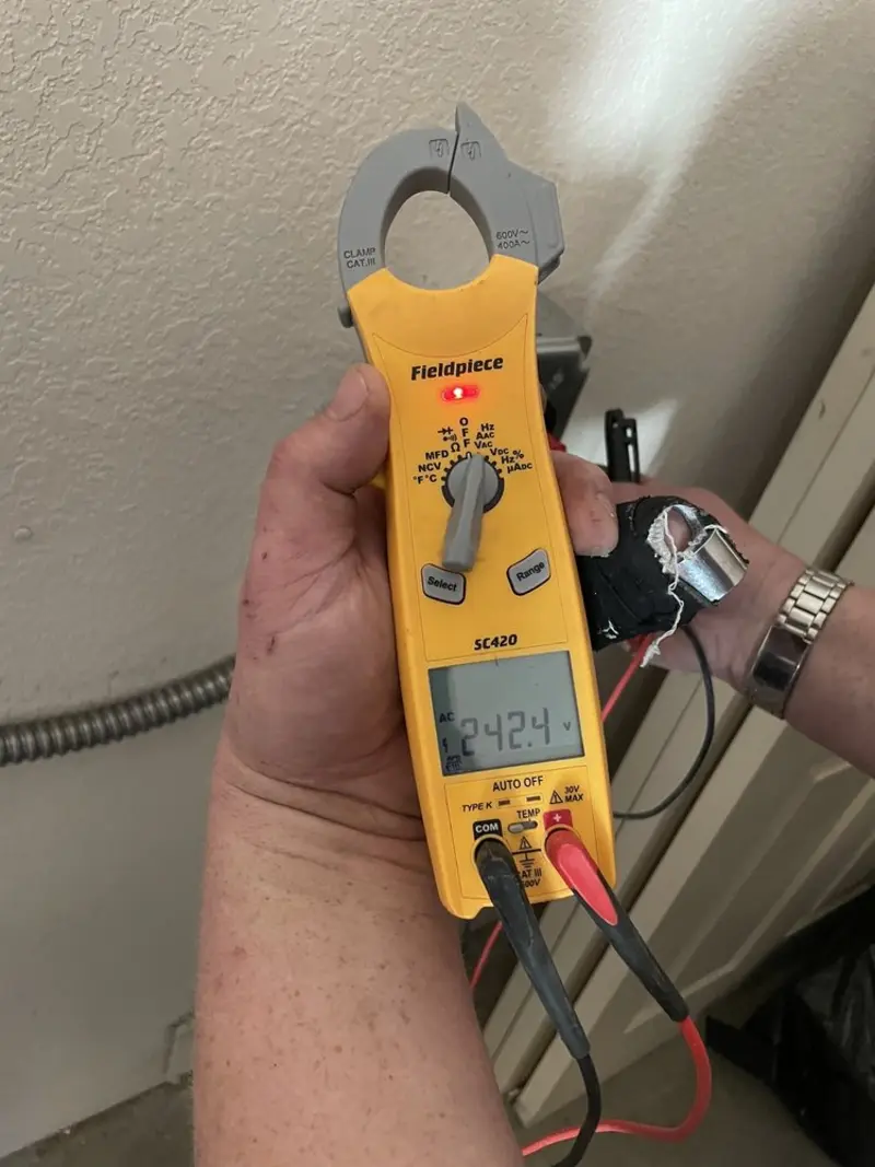 Voltage testing with clamp meter during Hot Tub / Pool Electrical Wiring in Lindsborg